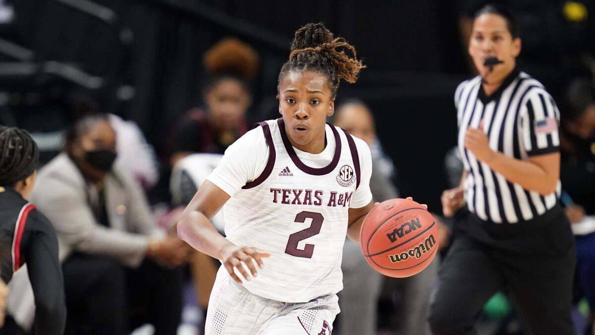 Texas A&M guard Aaliyah Wilson (2) brings the ball down court against Lamar during the second half of an NCAA college basketball game Wednesday, Nov. 25, 2020, in College Station, Texas. (AP Photo/Sam Craft)