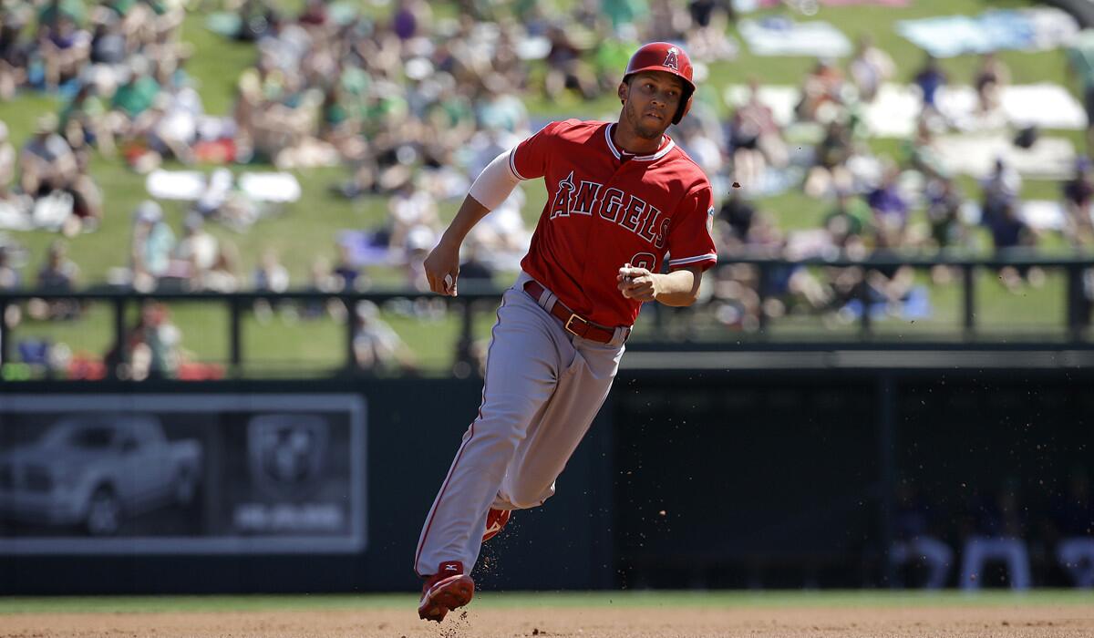 Angels' Andrelton Simmons runs during a spring training baseball game against the Colorado Rockies in Scottsdale, Ariz., on March 17.