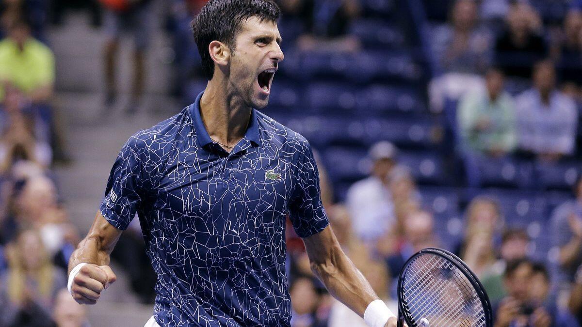 Novak Djokovic celebrates after defeating Kei Nishikori during the semifinals of the U.S. Open on Friday.