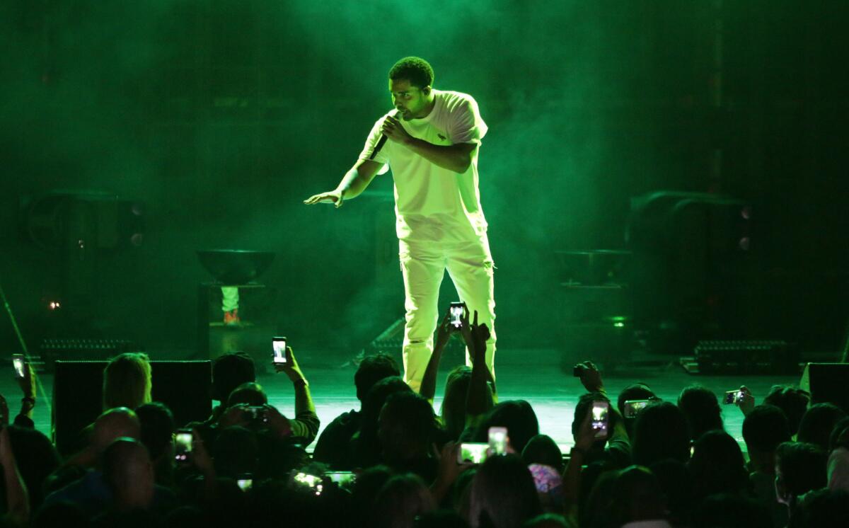 Drake performs Monday night at the Hollywood Bowl, where he appeared with Lil Wayne (not pictured).