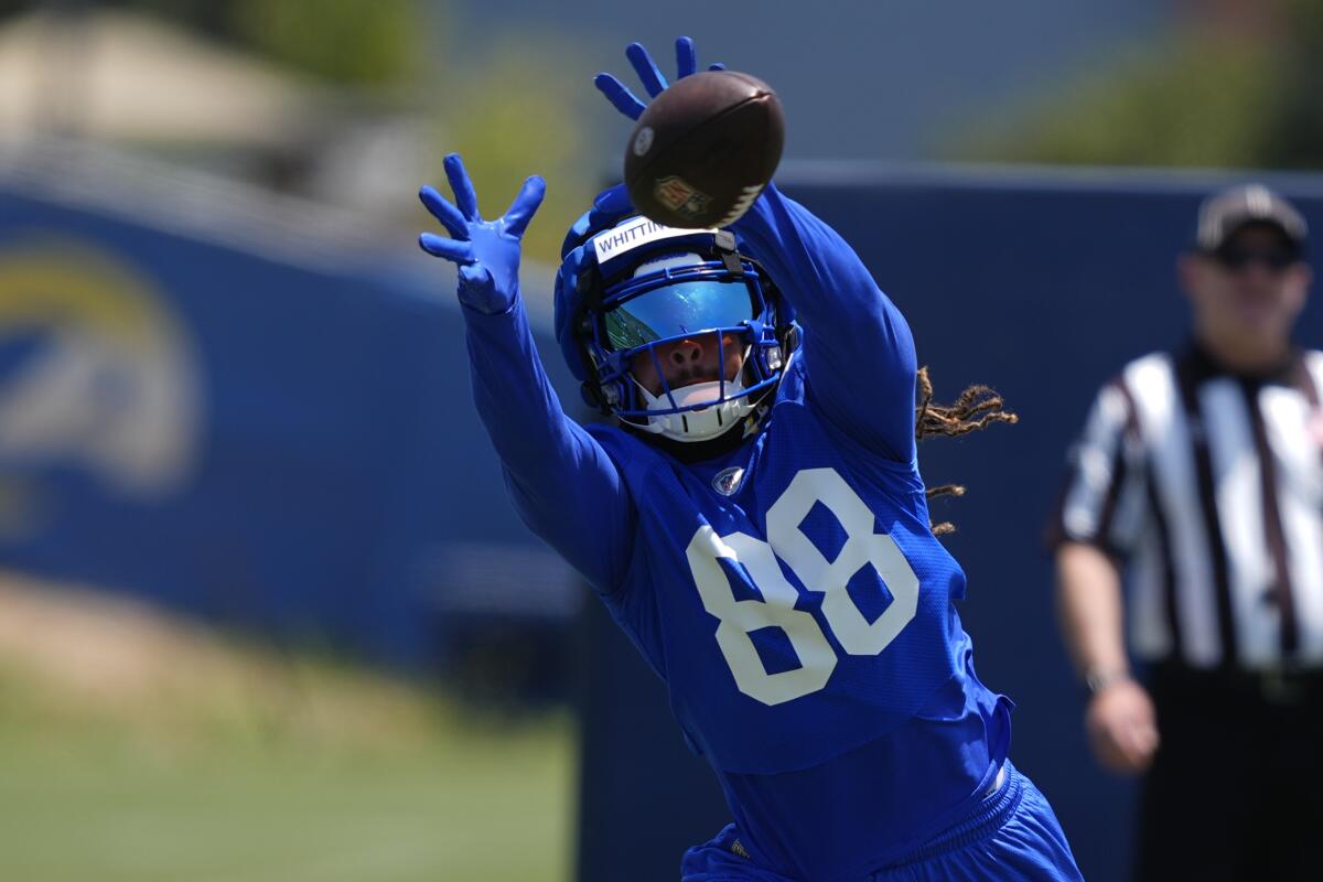 Rams wide receiver Jordan Whittington catches a ball during camp.