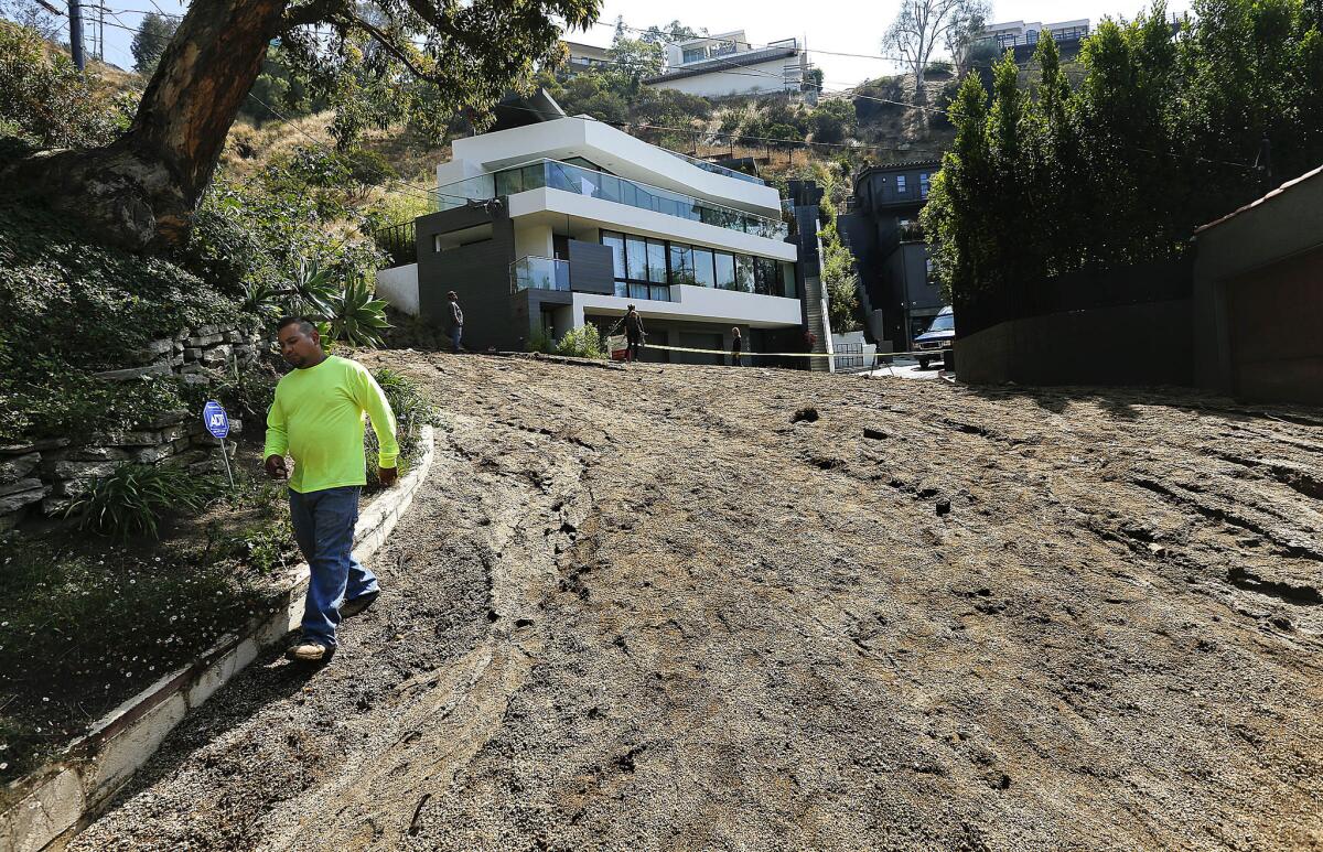 Mud fills the street on Hillside Avenue in the Hollywood Hills after abroken fire hydrant sent debris and mud onto a number of streets including Hillside and Franklin avenues and Kings and Queens Roads.