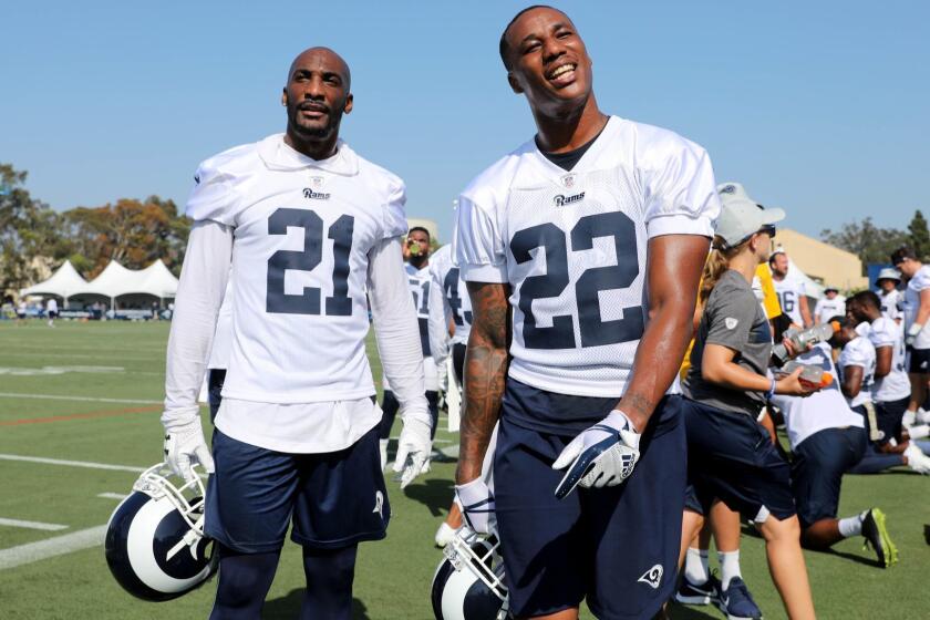 IRVINE, CALIF. -- THURSDAY, JULY 26, 2018: Cornerback Aqib Talib (21) and cornerback Marcus Peters (22) at the Los Angeles Rams training camp on the Campus of the University of California Irvine in Irvine, Calif., on July 26, 2018. (Gary Coronado / Los Angeles Times)