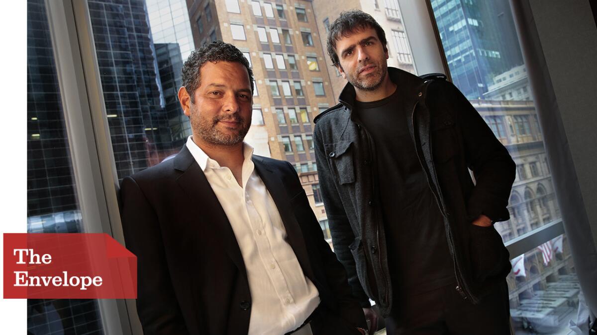Alexander Dinelaris, left, and Nicolas Giacobone say they knew that what they left in the script for "Birdman" would end up on the screen because of the film's one-shot narration.