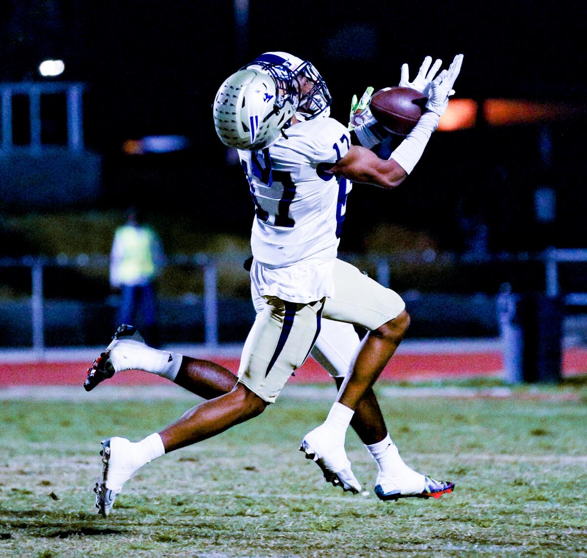 Peyton Waters of Birmingham makes an interception in the first quarter.