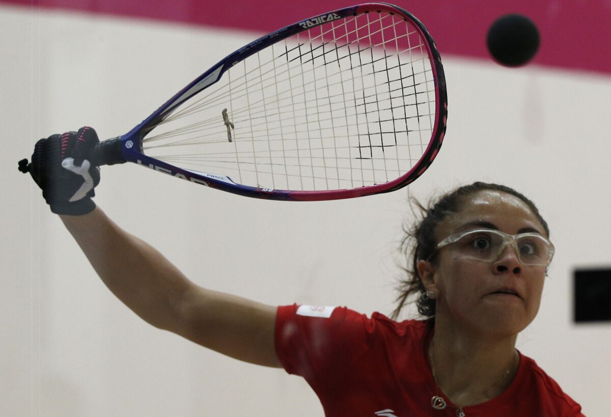 Paola Longoria of Mexico returns a shot during a women's racquetball singles semifinals match against Natalia Mendez of Argentina, at the Pan American Games in Lima Peru, Tuesday, Aug. 6, 2019. (AP Photo/Juan Karita)