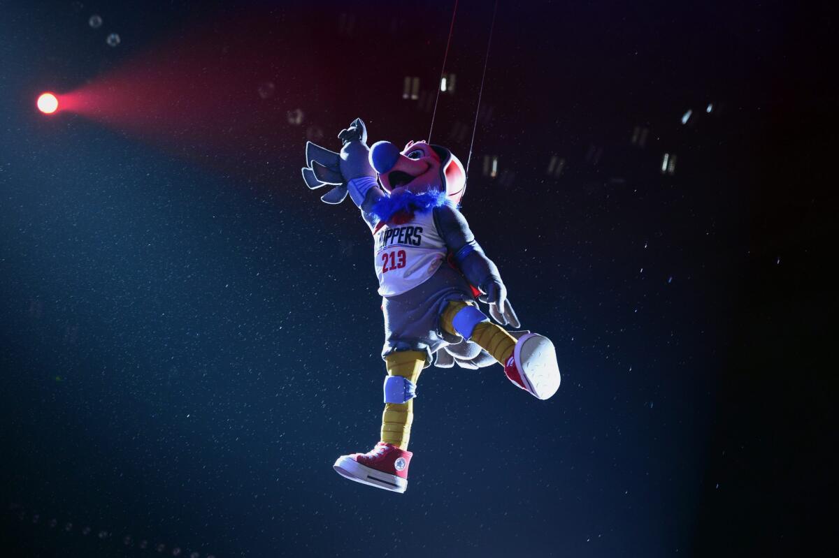 Chuck the Condor, the Clippers' new mascot, descends from the rafters during halftime of a game on Feb. 29.
