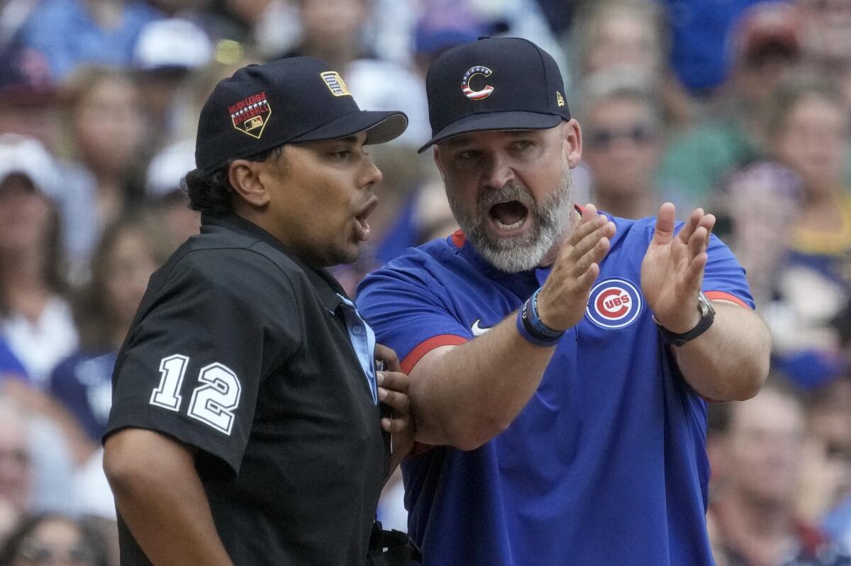 Cubs manager David Ross rips umpire and criticizes decision to close roof  in Milwaukee - The San Diego Union-Tribune