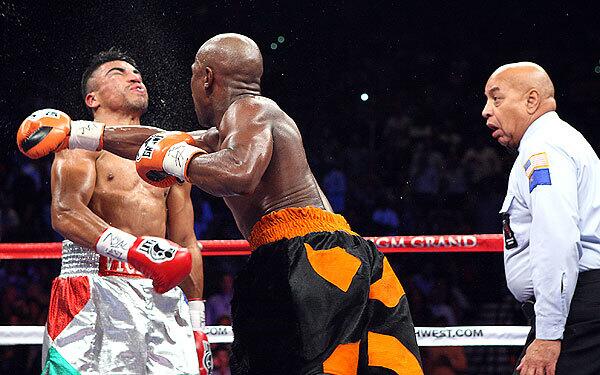 Floyd Mayweather defeats Victor Ortiz by knockout