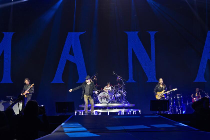 Mexican rock band Mana opens their 10-day residency at the Forum in Inglewood on Friday, March 18, 2022. Left to right are bassist Juan Calleros, lead singer Fher Olvera, drummer Alex Gonzalez and lead guitarist Sergio Vallin.