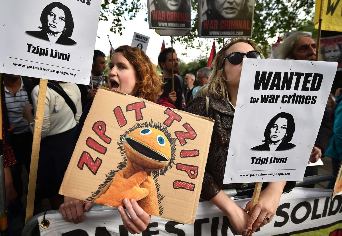 Demonstrators in London last week protest a visit to the city by Israeli Justice Minister Tzipi Livni. While there, she drew criticism from Israel by meeting with Palestinian Authority President Mahmoud Abbas.