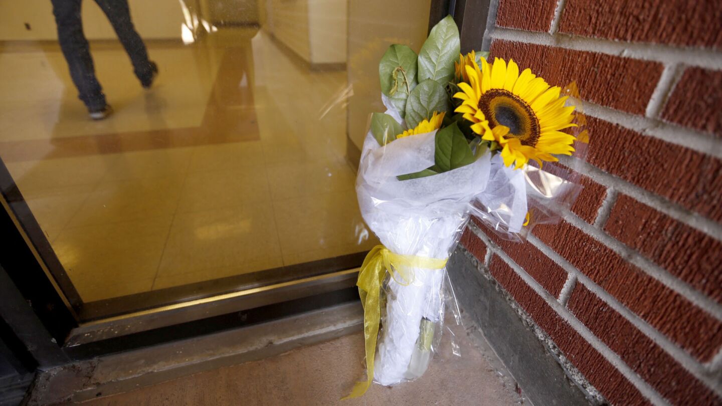 Flowers were left at the door of the Engineering IV Building on Thursday morning.