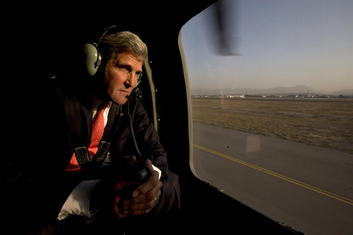 Secretary of State John F. Kerry takes off in a U.S. military helicopter in Kabul, Afghanistan, after arriving on an unpublicized visit to meet with Afghan President Hamid Karzai on Friday.