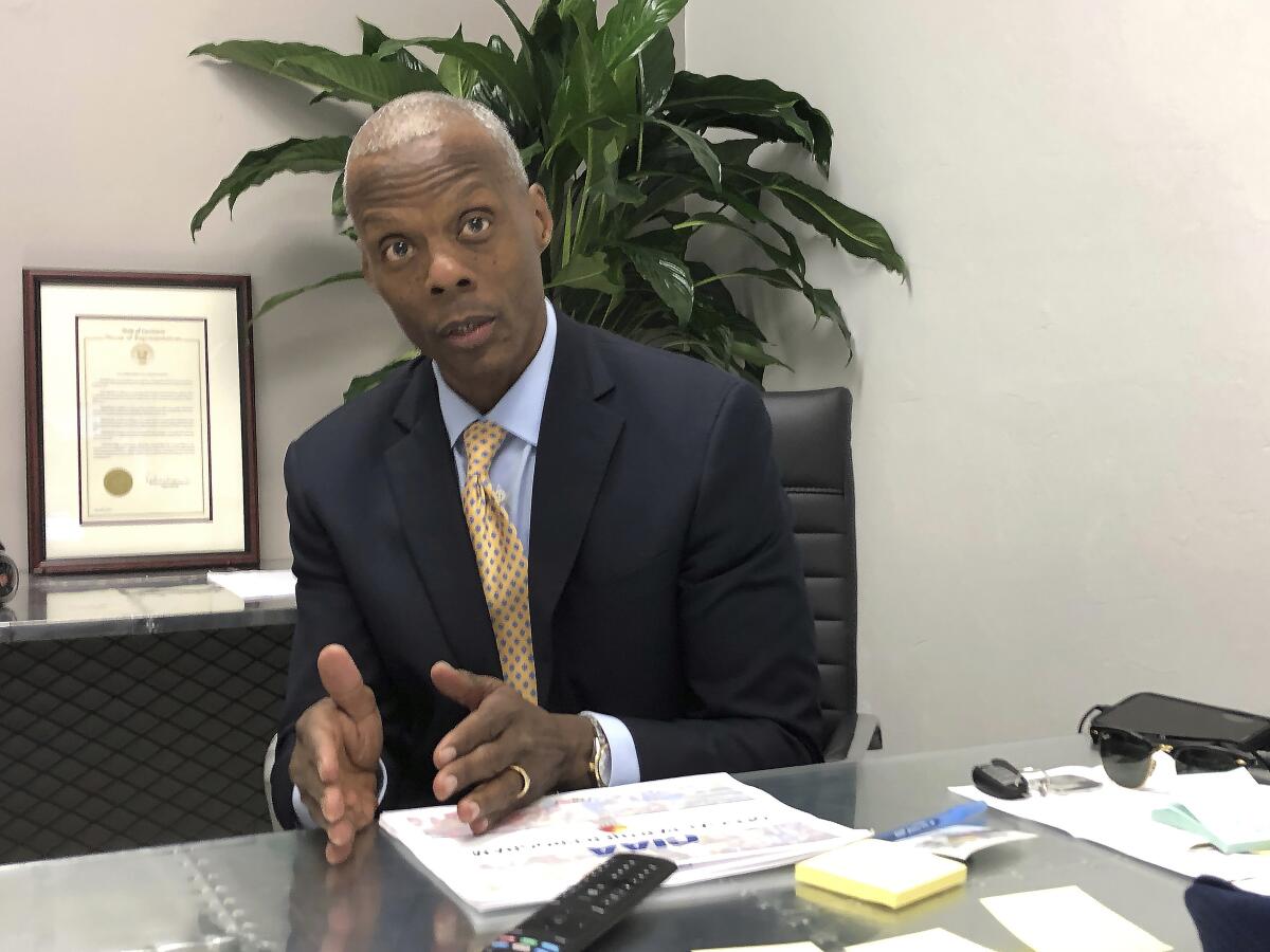 In this Thursday, Feb. 13, 2020, photo, Black News Channel Chairman J.C. Watts discusses the launch of the nations only 24-hour news network during an interview in Tallahassee, Fla. The launch followed years of planning for former U.S. Rep. Watts, who likened it too giving birth to a child. It is also made possible by the backing of billionaire businessman and Jacksonville Jaguars owner Shad Khan. (AP Photo/Brendan Farrington)