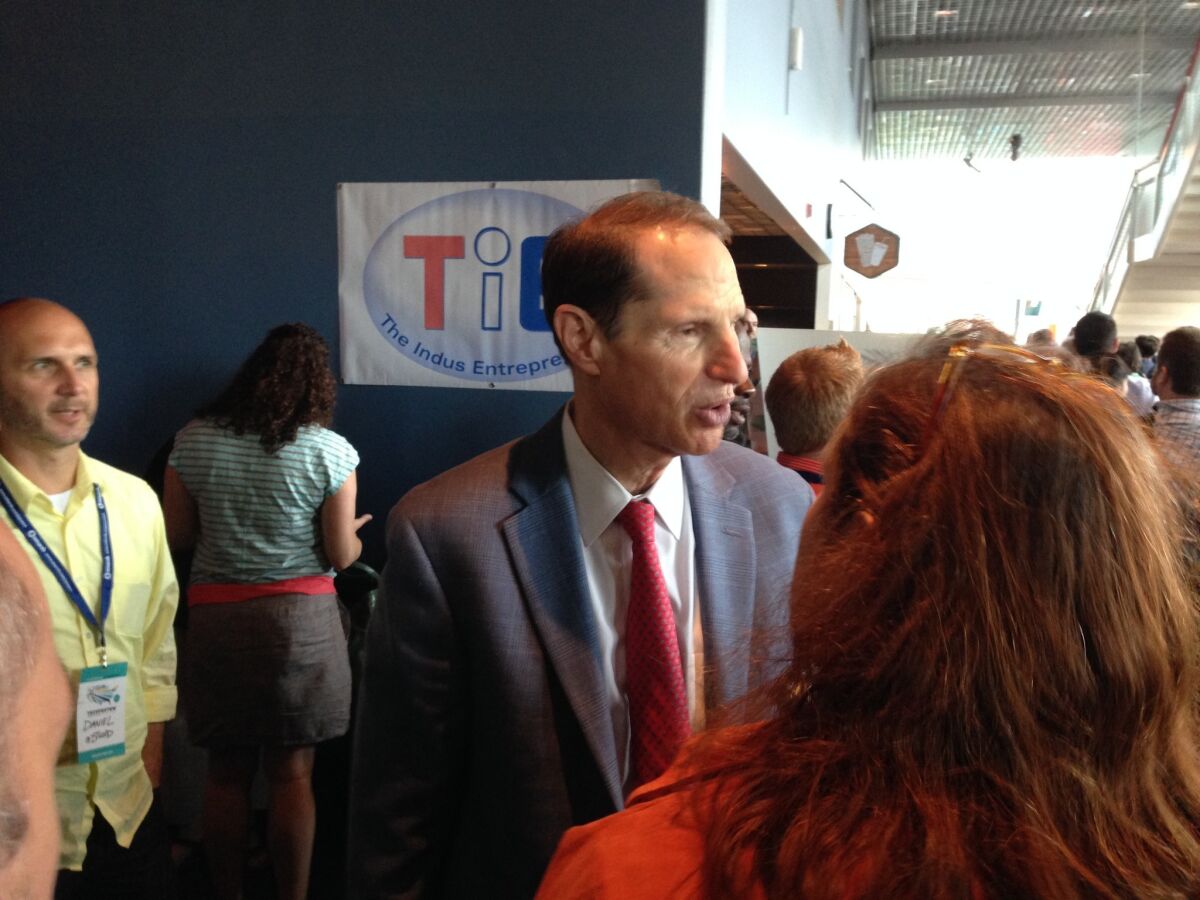 Sen. Ron Wyden (D-Ore.), who sits on the U.S. Senate Select Committee on Intelligence, called the meeting of tech leaders to discuss how U.S. mass surveillance programs have challenged tech innovation and global competitiveness. Above, Wyden attends an event in Portland in August.