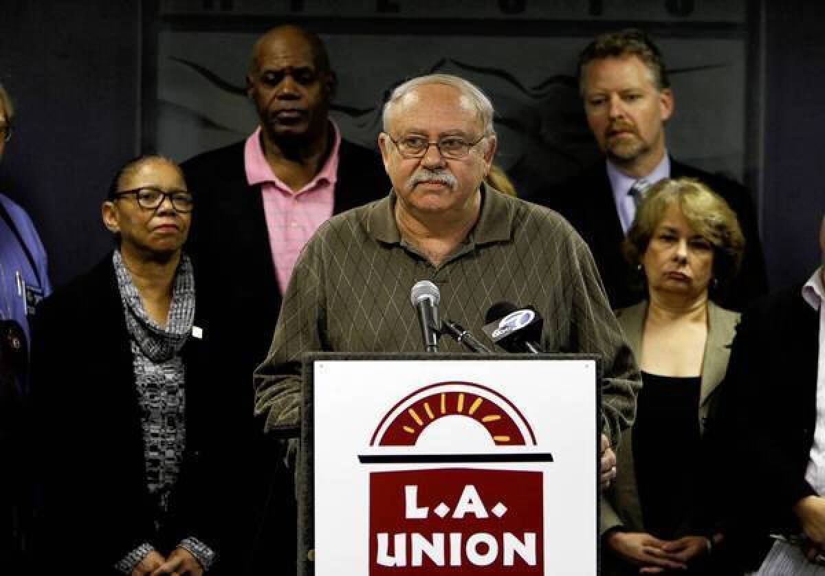 SEIU 721, which has 55,000 members, has been working without a contract for a month. Above, local President Bob Schoonover speaks in Los Angeles.