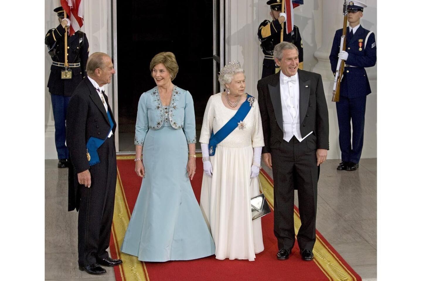 Queen Elizabeth II and Prince Philip with President George W. Bush and First Lady Laura Bush at the White House in May 2006.