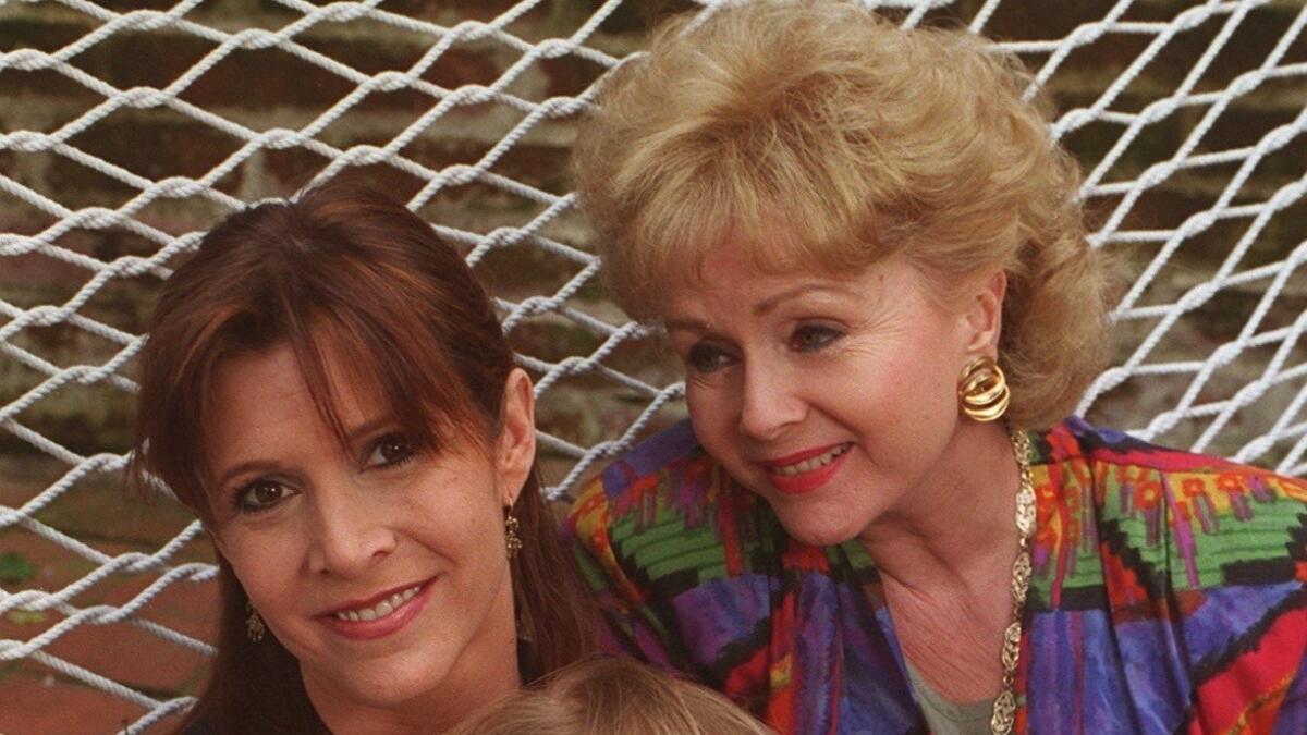 Actress Carrie Fisher and her mother, actress Debbie Reynolds.