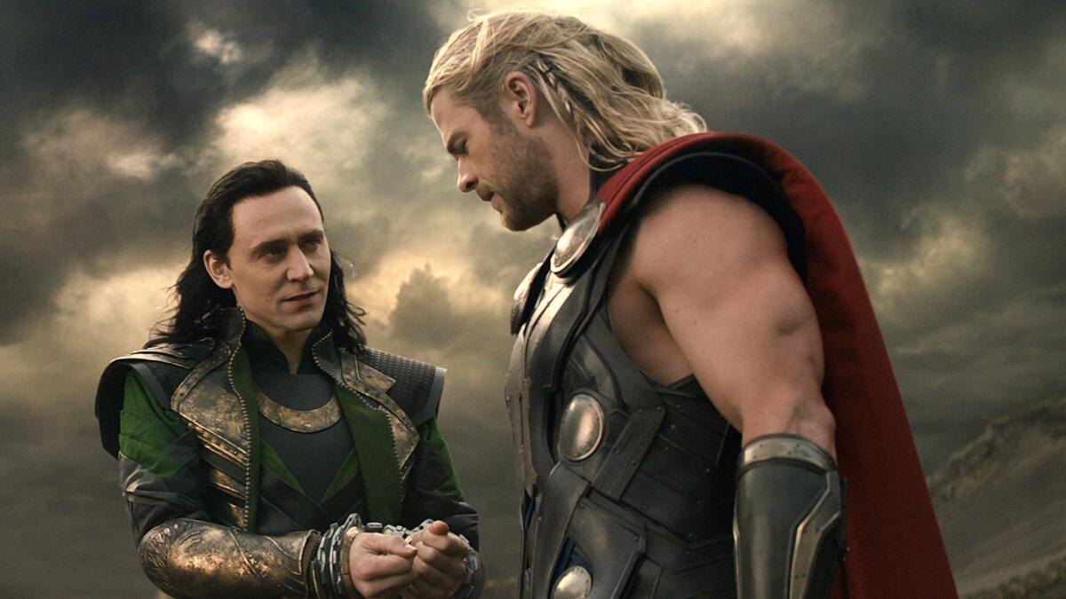 Tom Hiddleston, left, and Chris Hemsworth modeling reasonable hairstyles in "Thor: The Dark World."