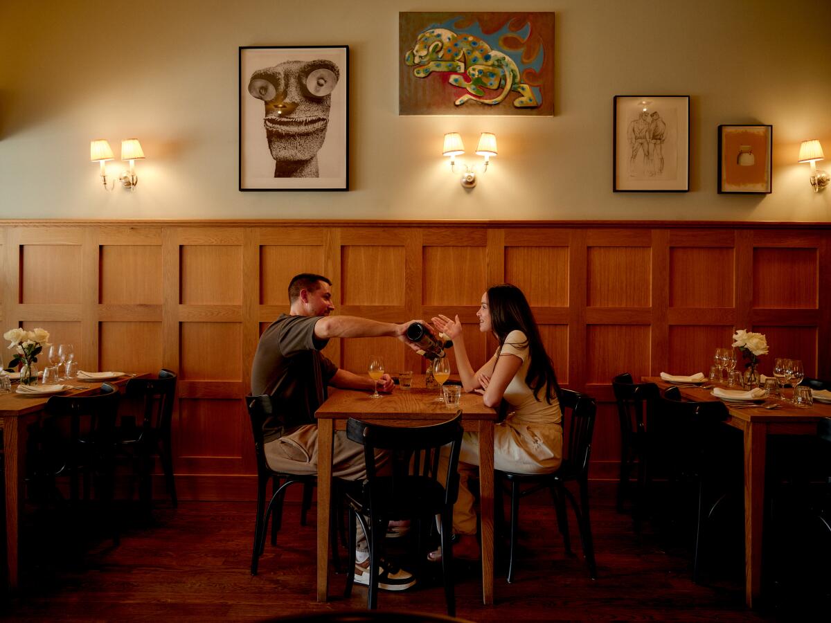 Diners early in the evening at Stir Crazy, a coffee spot turned restaurant.