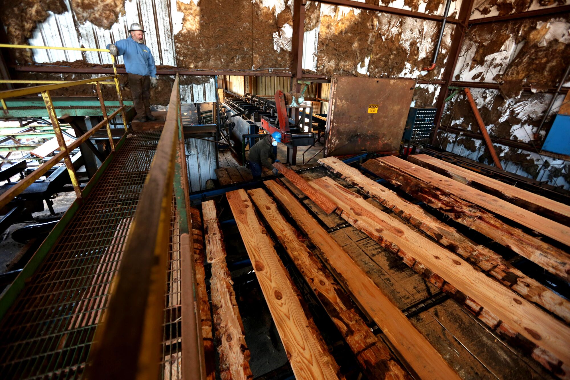 Chris Baldo oversees operations at the Willits Redwood Co. timber mill.