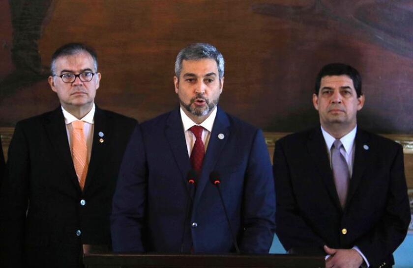 The president of Paraguay, Mario Abdo Benítez (C), speaks at a press conference accompanied by members of his cabinet, at the Government Palace, in Asuncion, Paraguay, 10 January 2019. EFE-EPA/Andres Cristaldo