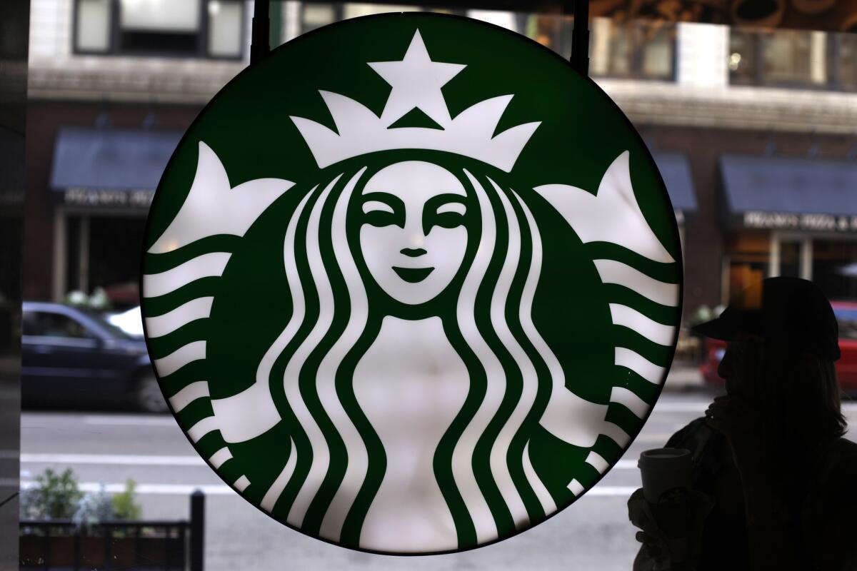 In this May 2014 file photo, the Starbucks logo is seen at one of the company's coffee shops in downtown Chicago.