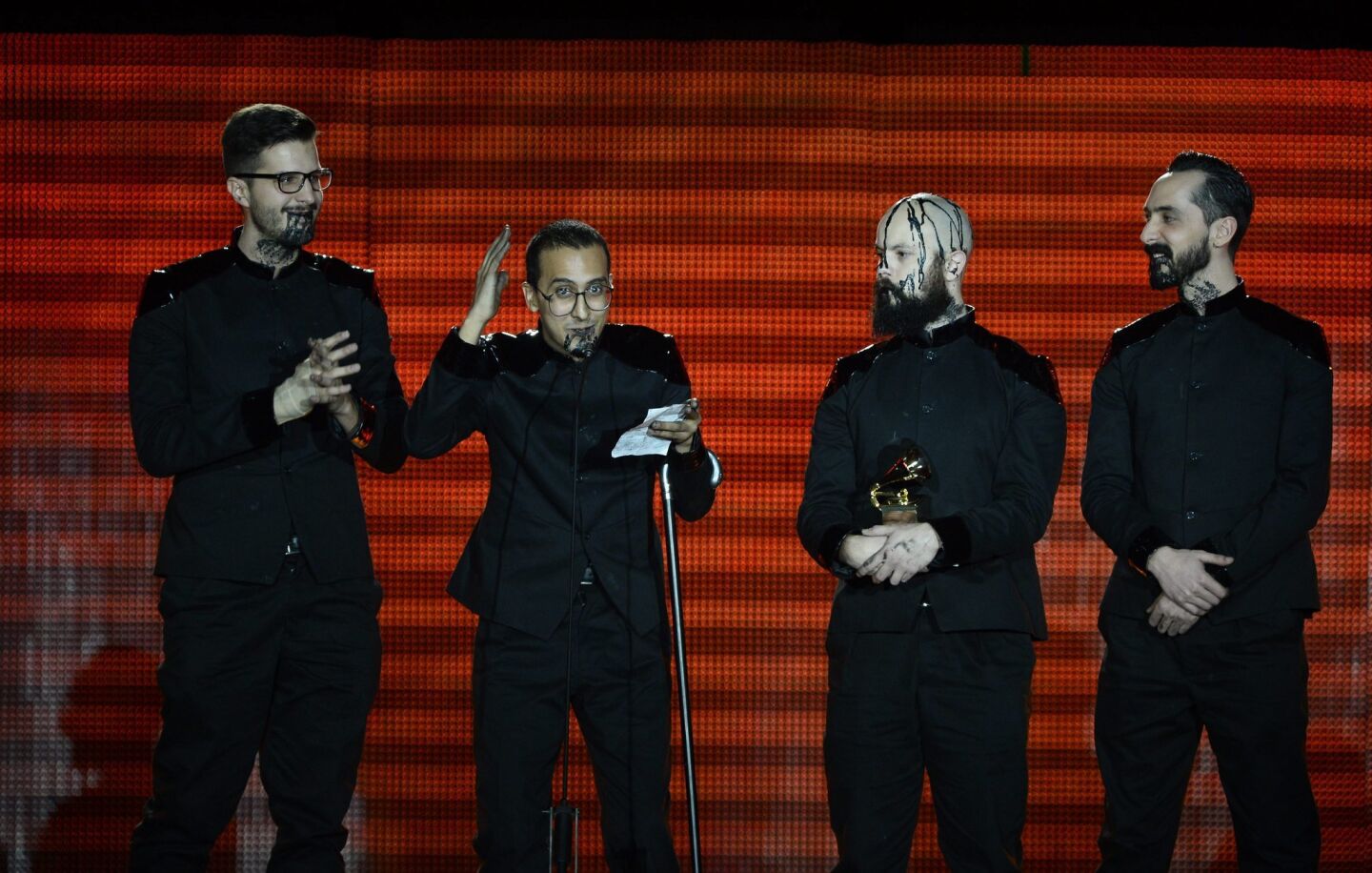 Members of Venezuelan band La Vida Boheme -- Daniel De Sousa, left, Henry D'Arthenay, Rafael Perez and Sebastian Ayala -- hold their award for best rock album.