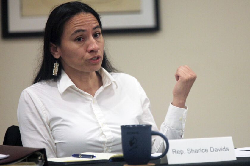 Rep. Sharice Davids, D-Kan., answers questions during a meeting with local leaders in a community college training center in Kansas City, Kan., Sept. 8, 2022. Republicans redrew Davids’ district to make it harder to win, and she’s focusing on abortion rights in her race against Republican challenger Amanda Adkins after Kansas voters rejected an anti-abortion measure. (AP Photo/John Hanna)