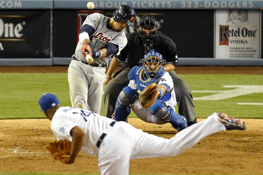 The Tigers' Victor Martinez hits a solo home run off Dodgers reliever Kenley Jansen in the 10th inning at Dodger Stadium.
