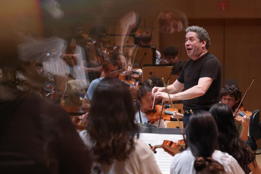 Los Angeles, CA - July 14: Conductor Gustavo Dudamel rehearses with young musicians from around the country participating in the L.A. Phil's annual YOLA National Program at Walt Disney Concert Hall on Friday, July 14, 2023 in Los Angeles, CA. (Dania Maxwell / Los Angeles Times).