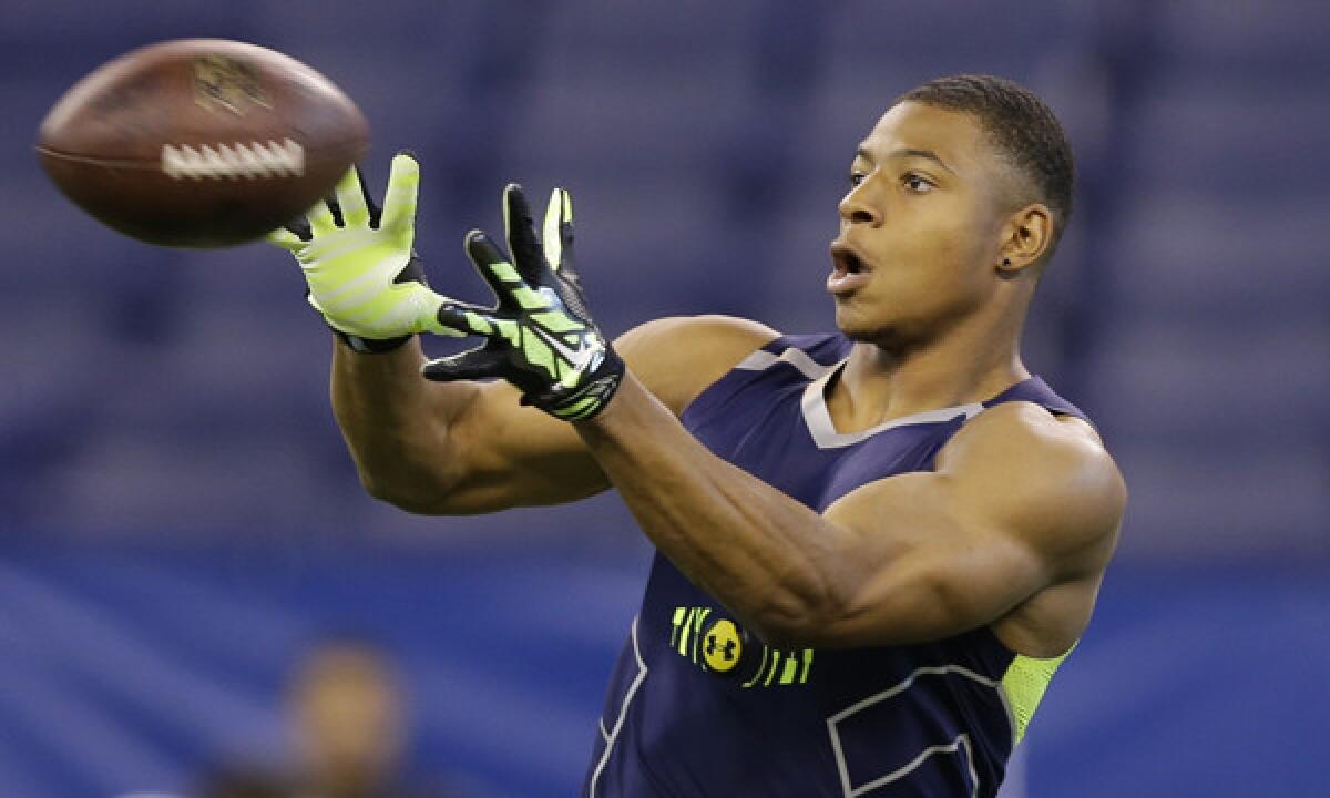 Wyoming wide receiver Robert Herron makes a catch at the NFL scouting combine in February. Herron, who played high school football at Dorsey, is one of several high-profile NFL prospects from Southern California.