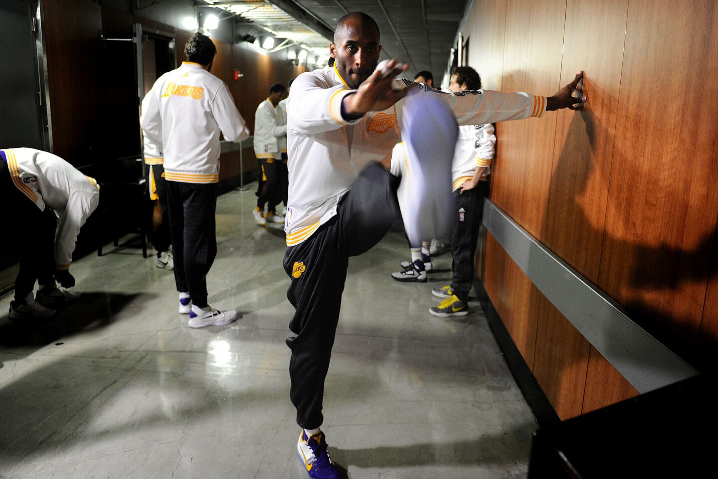 Lakers Kobe Bryant warms up outside the locker room before a game with the Knicks at the Staples Center.