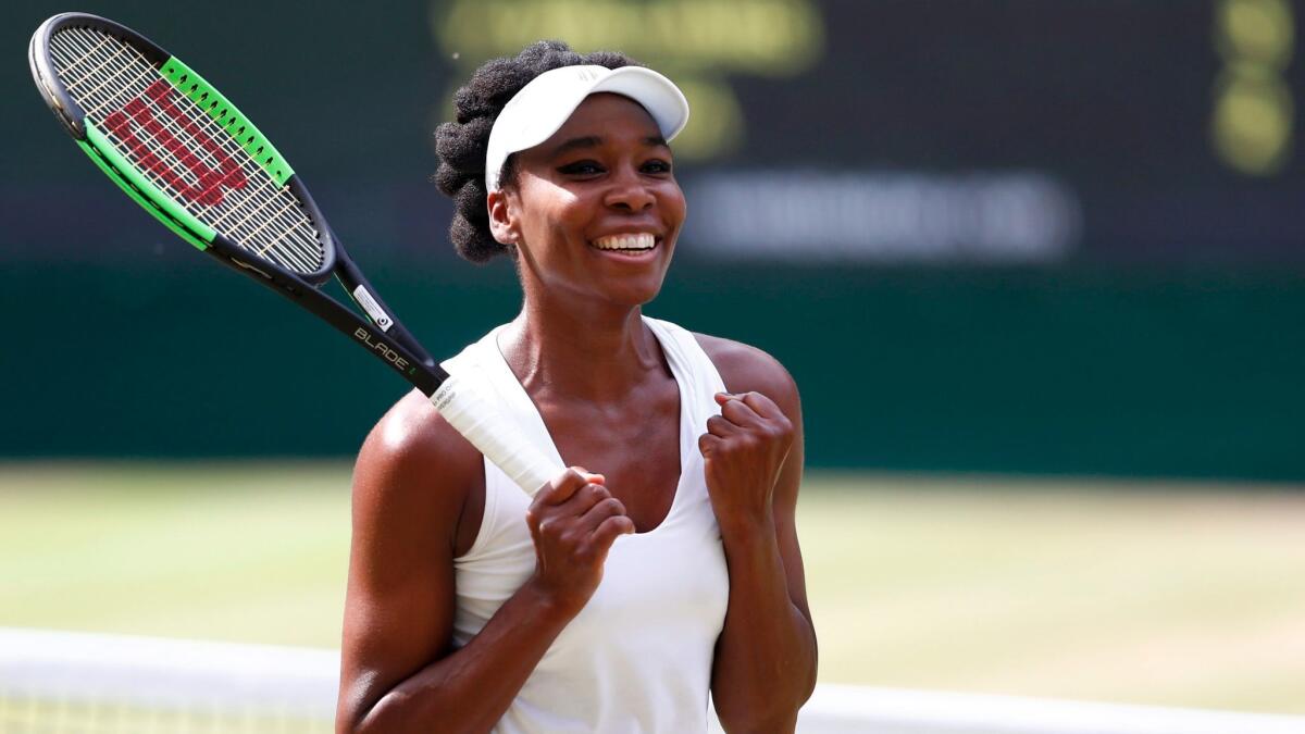 Venus Williams celebrates after beating Johanna Konta in the Wimbledon semifinals on July 13.