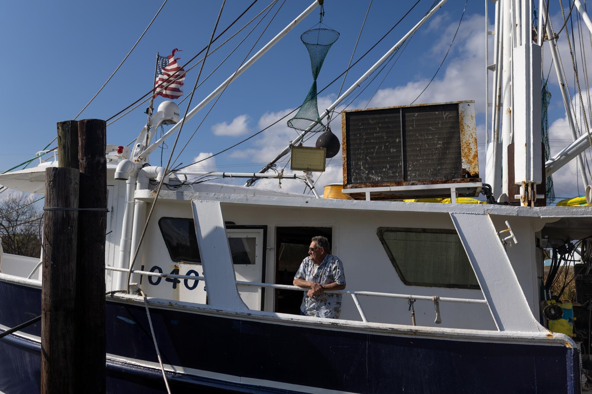 James Blanchard aboard his boat, which he docks in Bayou Little Caillou.