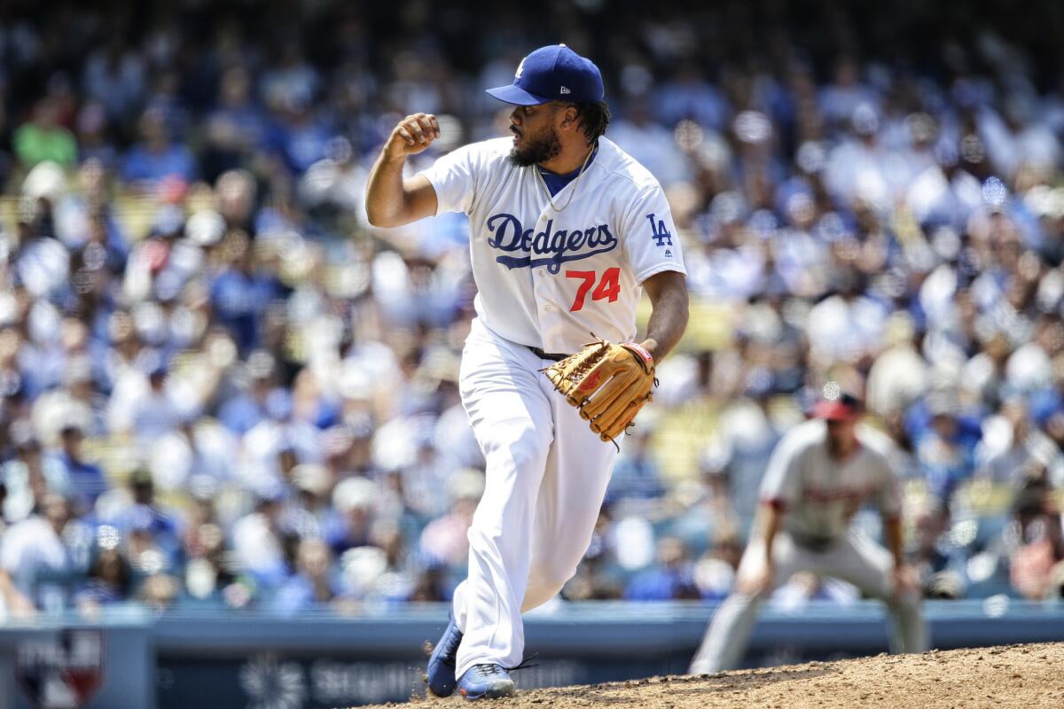 Closer Kenley Jansen reacts after picking up a save against the Nationals during a game this season.