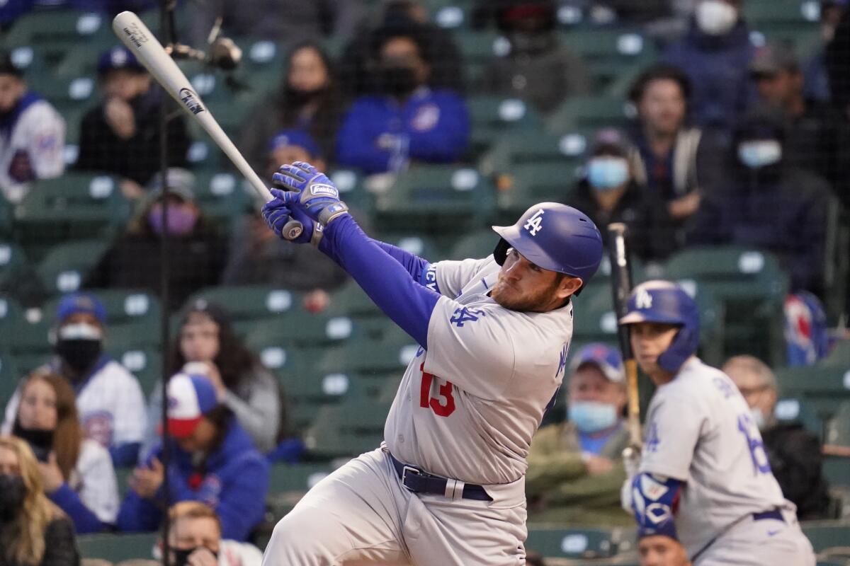 Dodgers' Max Muncy hits a solo home run.