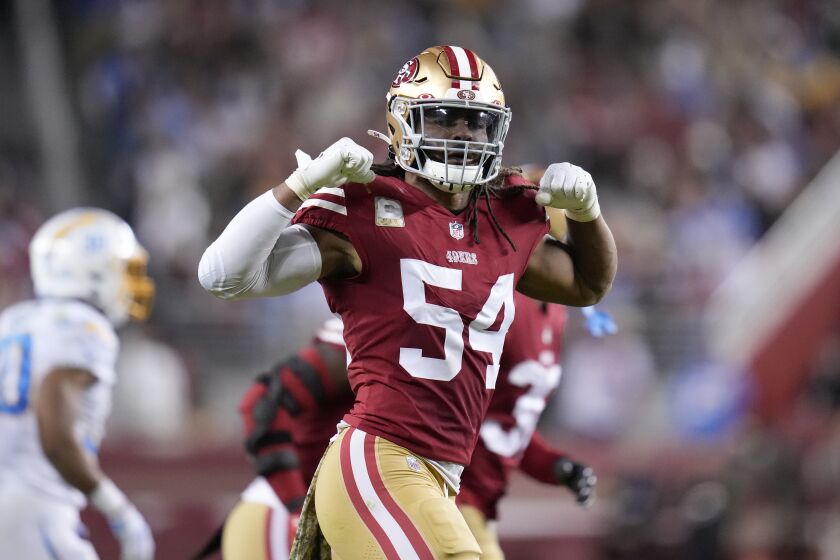 San Francisco 49ers linebacker Fred Warner (54) gestures during the first half of an NFL football game against the Los Angeles Chargers in Santa Clara, Calif., Sunday, Nov. 13, 2022. (AP Photo/Godofredo A. Vásquez)