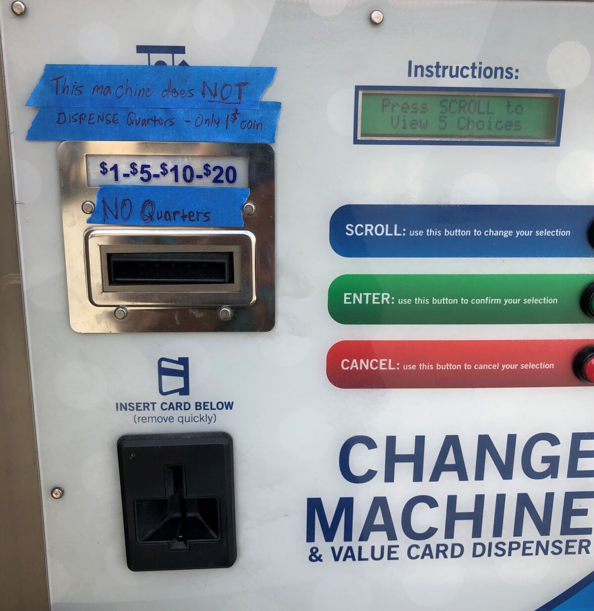 No quarters sign on cash machine at Auto Spa in Vista