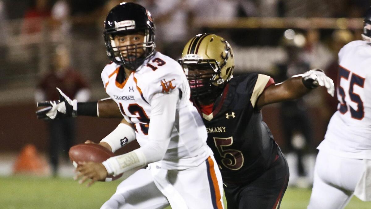 Tyree Thompson sacks Chaminade quarterback Dymond Lee while playing for Alemany in 2014.