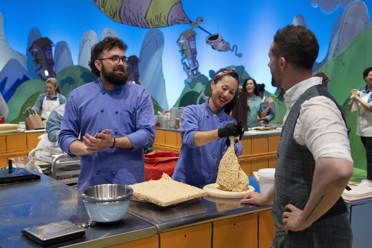 Carlsbad resident Huiwen Lu, right, with her baking teammate Kyle Smothers on the "Dr. Seuss Baking Challenge"