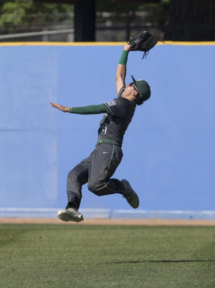 Sage Hill School's Edward Pelc (4) makes the catch in right field during the third inning against Crean Lutheran.