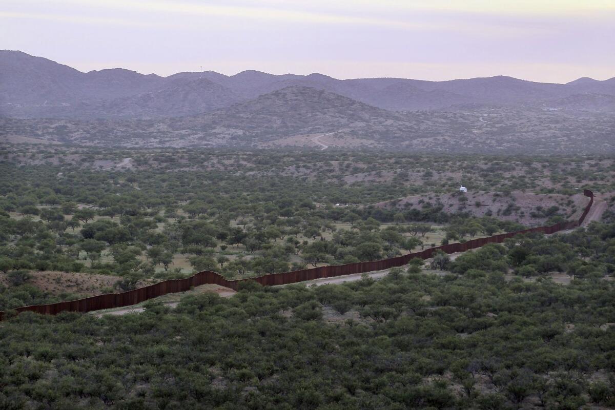 The border fence separating the U.S. and Mexico near Sasabe, Ariz. The Supreme Court rejected an appeal that shot down an Arizona law barring bail to immigrants in the U.S. illegally who are accused of a serious crime.