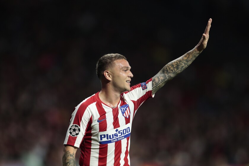FILE Atletico Madrid's Kieran Trippier gestures during the Champions League Group D soccer match between Atletico Madrid and Juventus at the Wanda Metropolitano stadium in Madrid, Spain, Wednesday, Sept. 18, 2019. Newcastle has begun its first transfer window under Saudi ownership by signing England fullback Kieran Trippier from Atletico Madrid. It highlights the level of player the club can attract now it is one of the richest in the world. (AP Photo/Bernat Armangue, File)