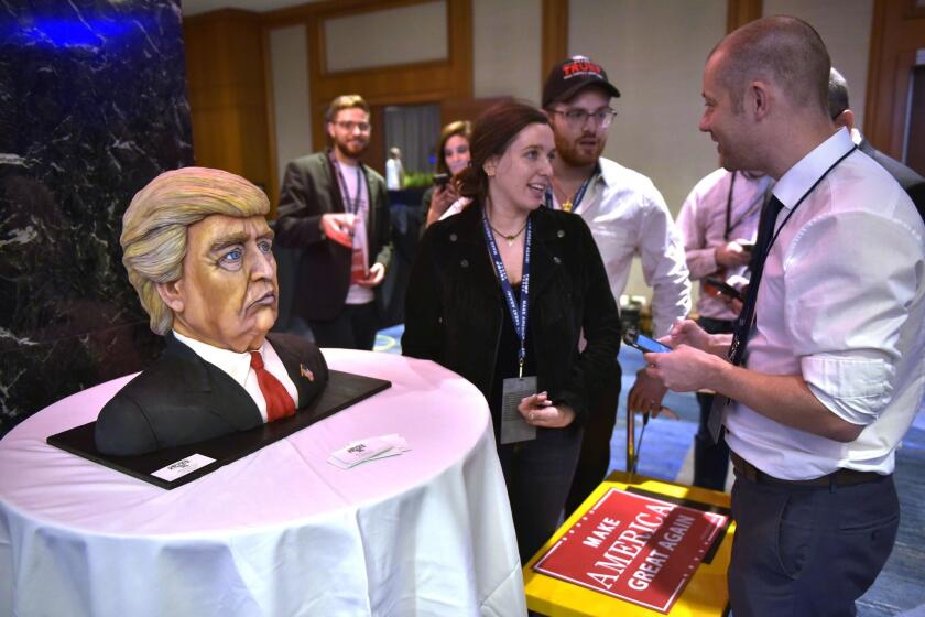 The 'Trump Cake' a sugary recreation of the Republican presidential nominee Donald Trump, appears at the election night party at the New York Hilton Midtown in New York on November 8, 2016.