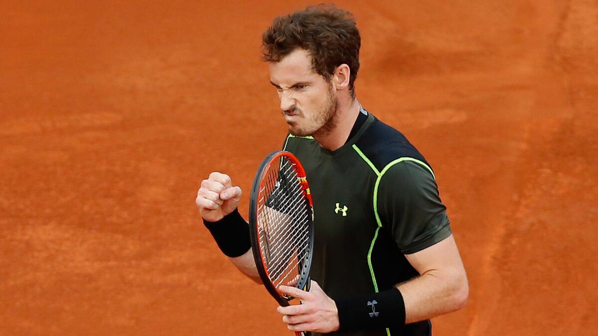 Andy Murray celebrates a point during his victory over Rafael Nadal in the Madrid Open final on Sunday.