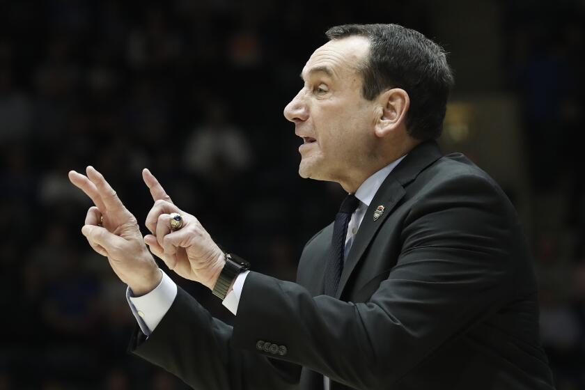 FILE - In this Jan. 28, 2020, file photo, Duke coach Mike Krzyzewski gestures during the second half of the team's NCAA college basketball game against Pittsburgh in Durham, N.C. Krzyzewski's ninth-ranked Blue Devils are picked to finish second in the Atlantic Coast Conference behind No. 4 Virginia. (AP Photo/Gerry Broome, File)
