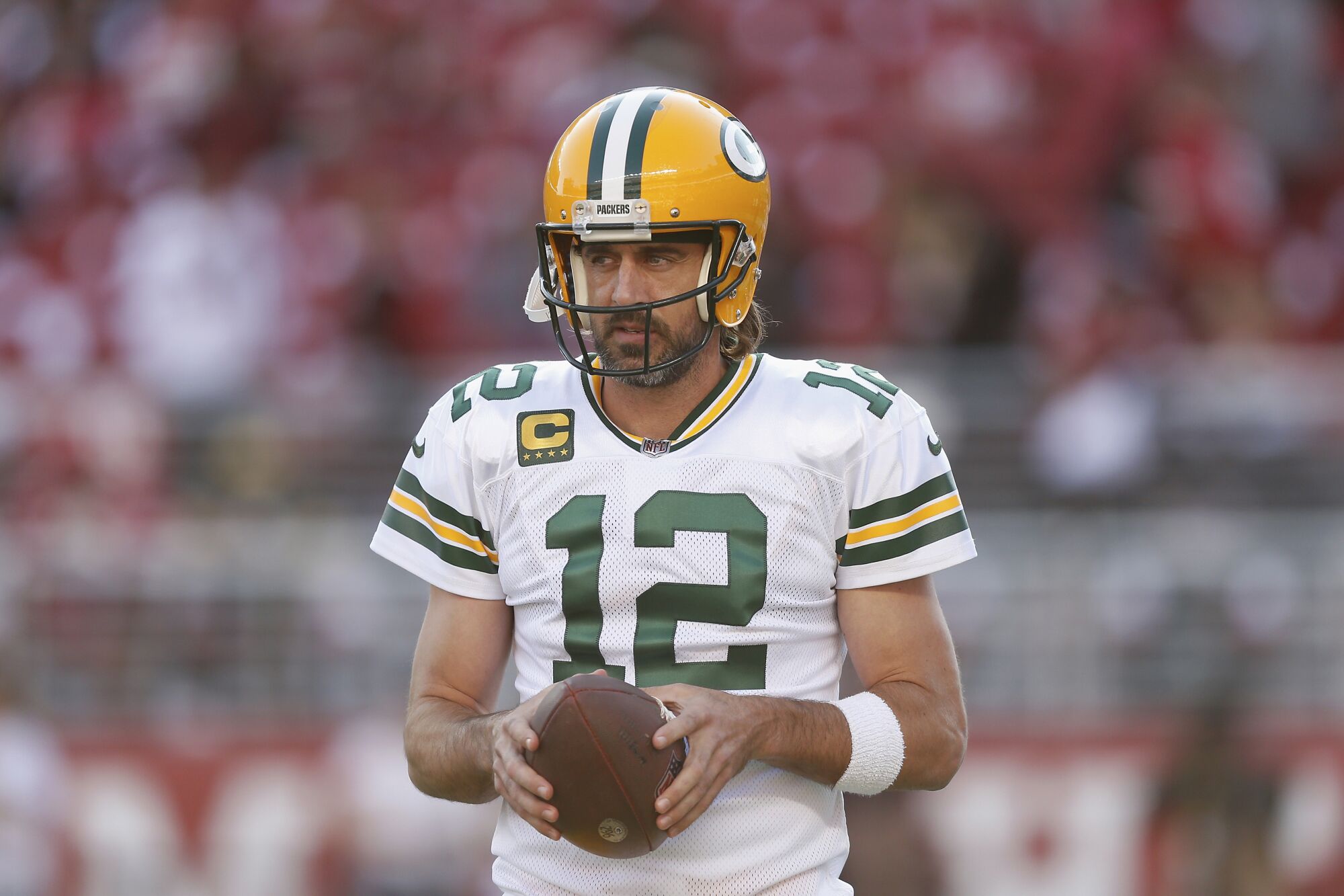 Green Bay Packers quarterback Aaron Rodgers looks on during the pre-game warm up.