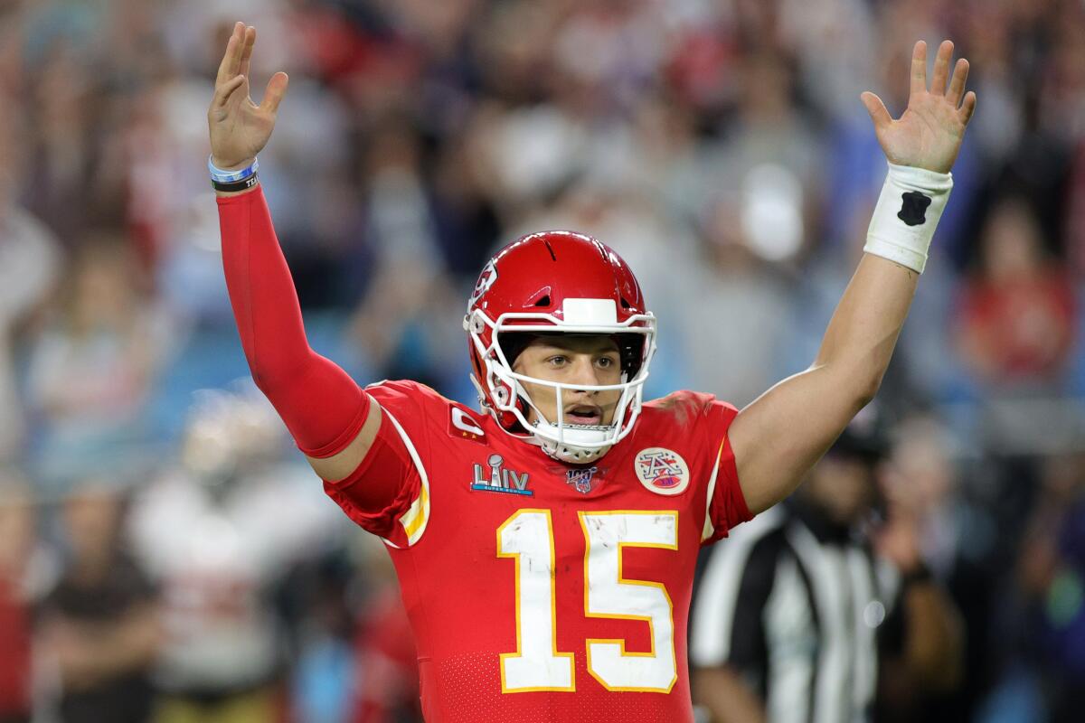 Patrick Mahomes of the Kansas City Chiefs celebrates after throwing a touchdown pass against the San Francisco 49ers during the fourth quarter in Super Bowl LIV at Hard Rock Stadium last month in Miami.