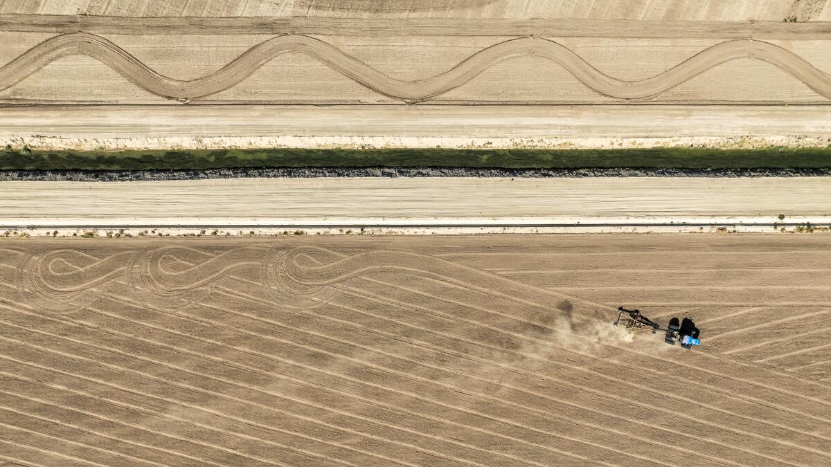 A tractor in a field.